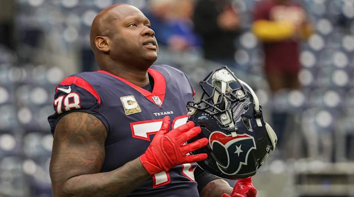 Texans offensive tackle Laremy Tunsil warms up on the field before a game.